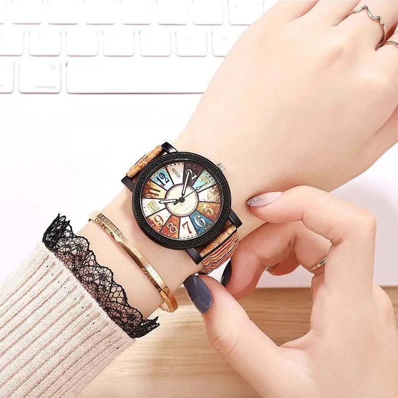Women's vintage leather strap quartz watch with 37mm round dial and stainless steel buckle
