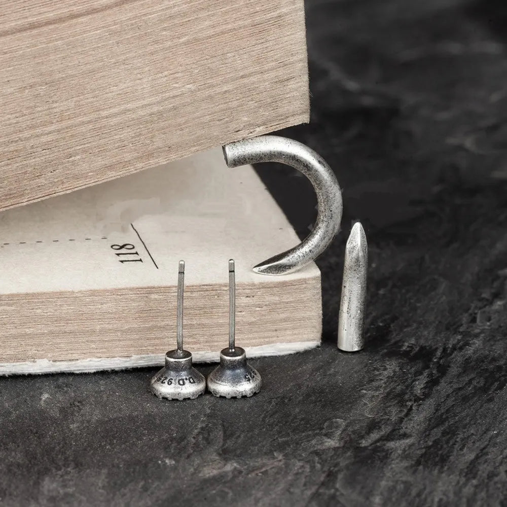 S925 sterling silver punk nail stud earring in straight and curved style options.
