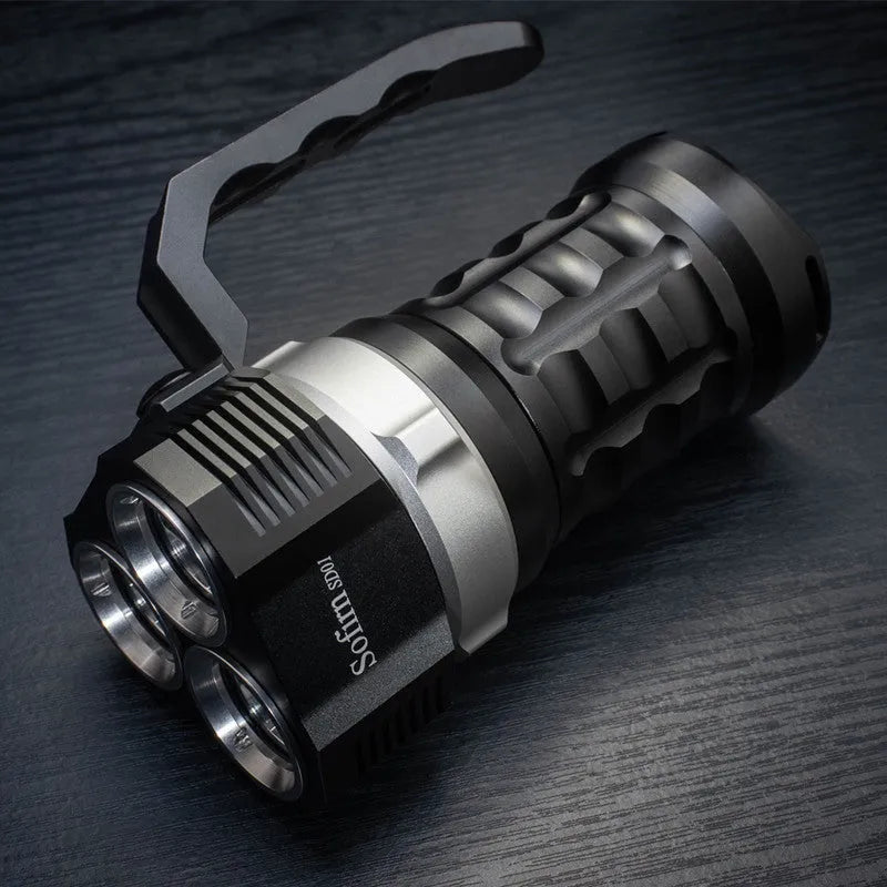 Aluminium alloy diving tube flashlight, 18cm long, shown in hand for scale.