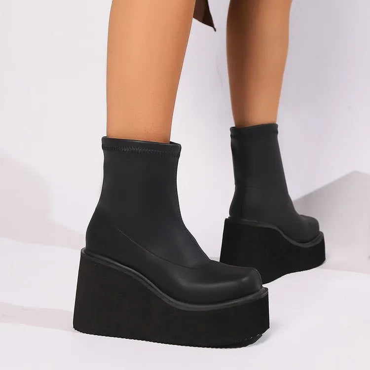 Plus size women's wedge heel boots with waterproof platform sole in black artificial PU leather