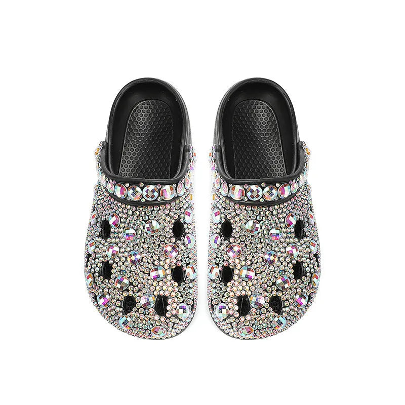Black women's platform sandals with rhinestone detail on EVA upper.