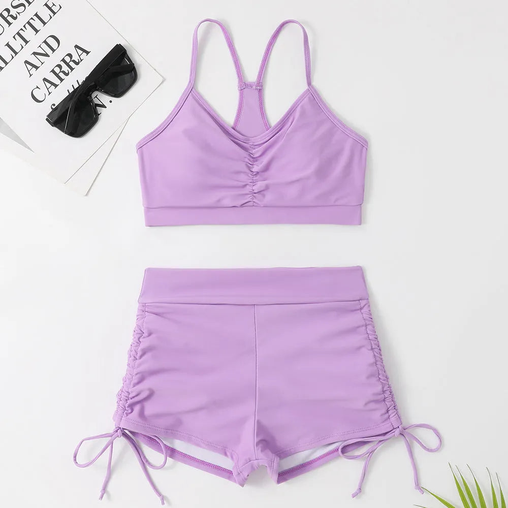 Women's high waist split swimsuit in black or purple with nylon spandex construction