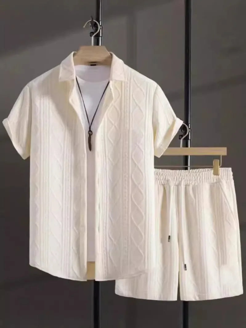 Jacquard patterned short sleeve shirt and matching shorts suit set on a hanger.