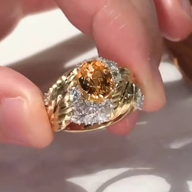 Copper women's ring with embossed feather design and yellow zircon stone in gold colour finish
