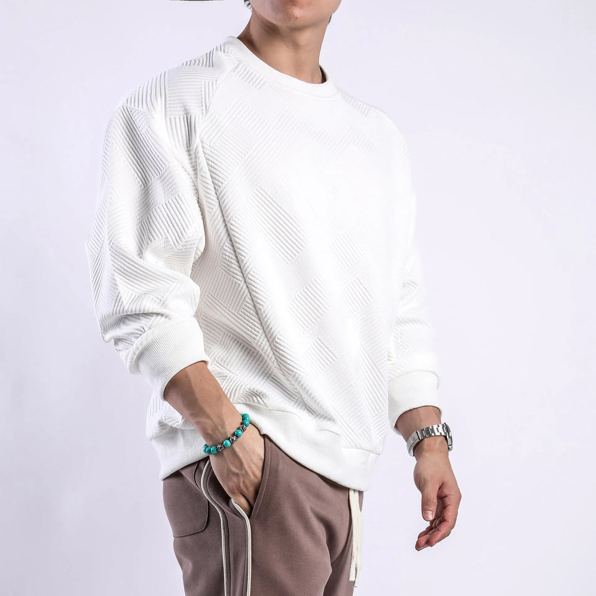 Men's army green twill Jacquard pullover sweater with round neck and long sleeves laid flat