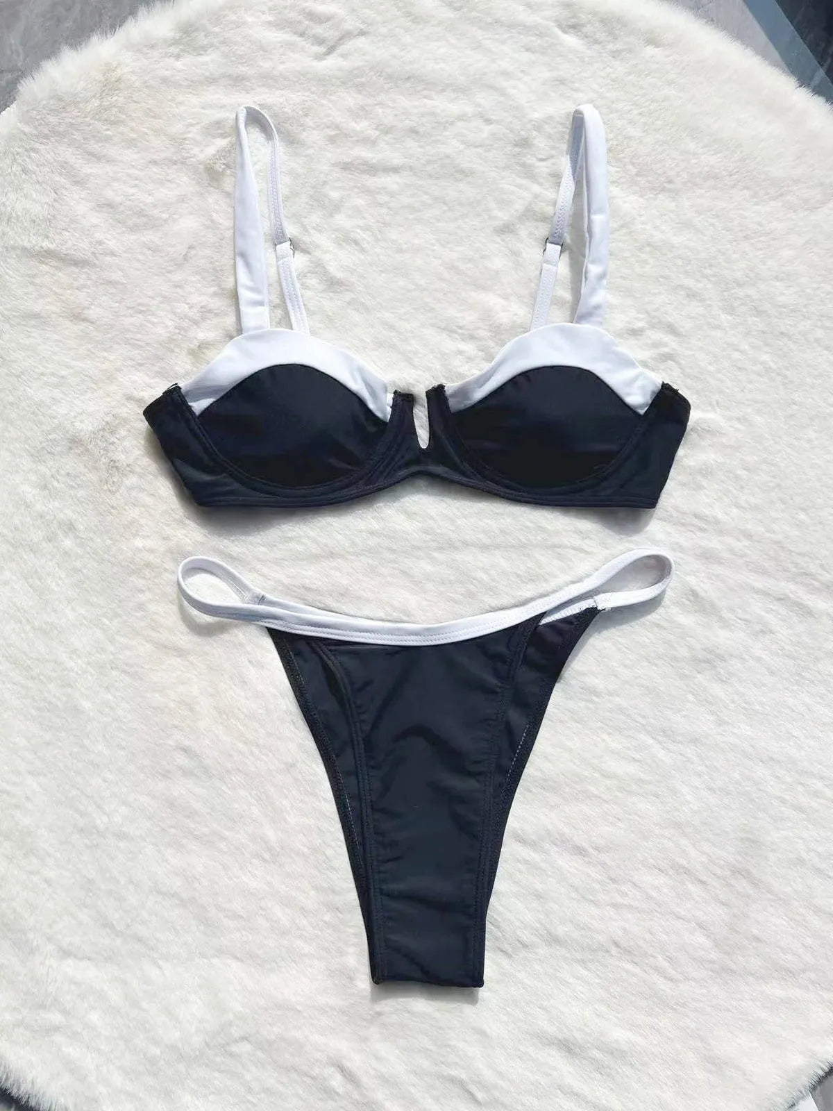 Black women's low waist bikini swimsuit set with stitching detail on split briefs
