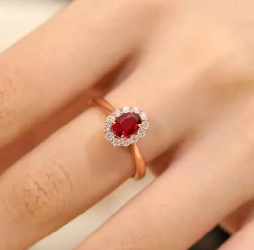 Women's silver ring with blood ruby artificial gemstone and gold pigeon floral design