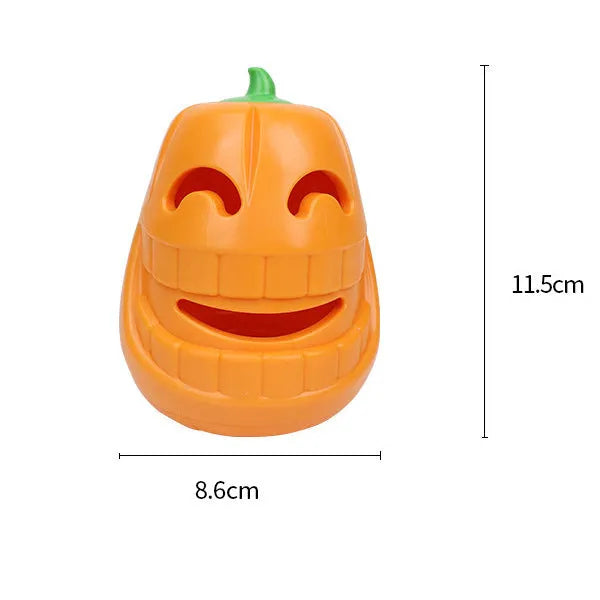 Orange Halloween pumpkin shaped interactive dog chew toy with treat-dispensing funnel.