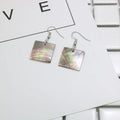 Women's geometric shell earrings in square or rectangular designs with natural patterning