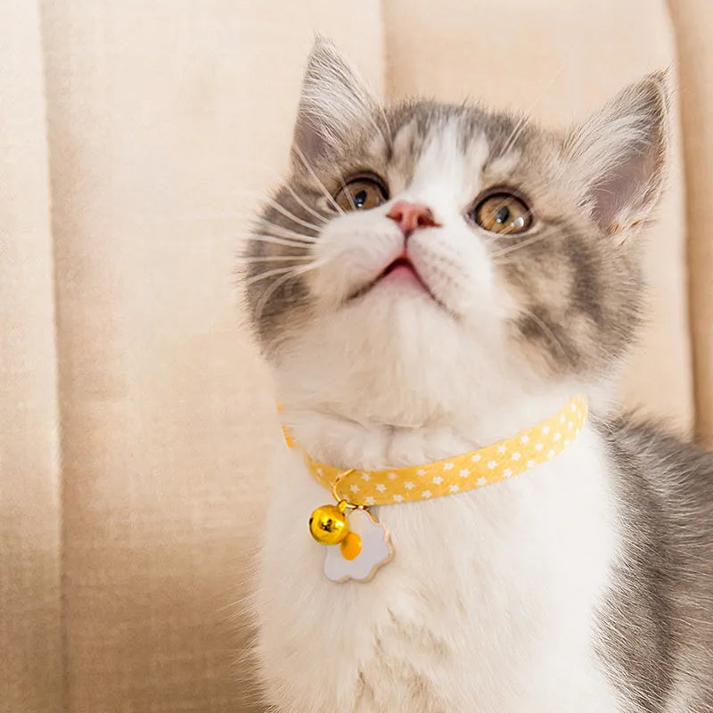 Adjustable cat collar with bell and decorative bow tie pendant in multiple colours