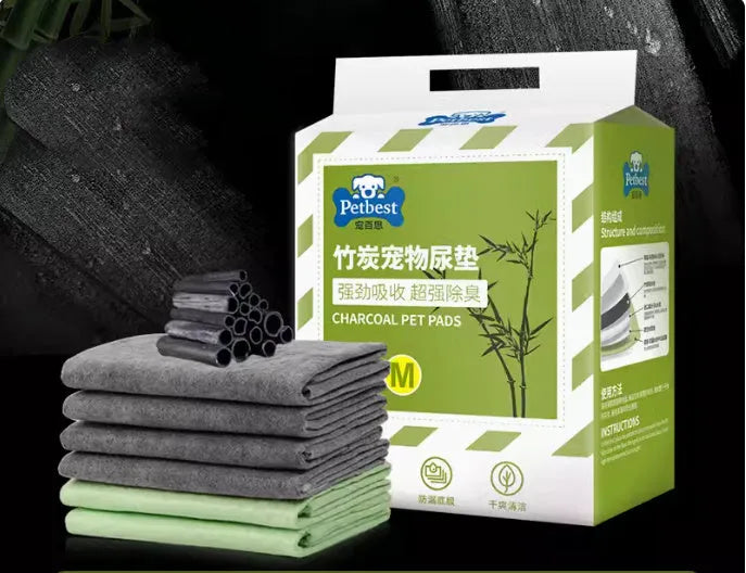 Pack of thickened dog urine pads showing size options and bamboo charcoal or lemon scent variants