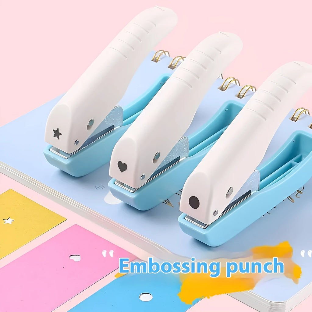 Small manual punching machine with four embossed pattern heads for paper crafts