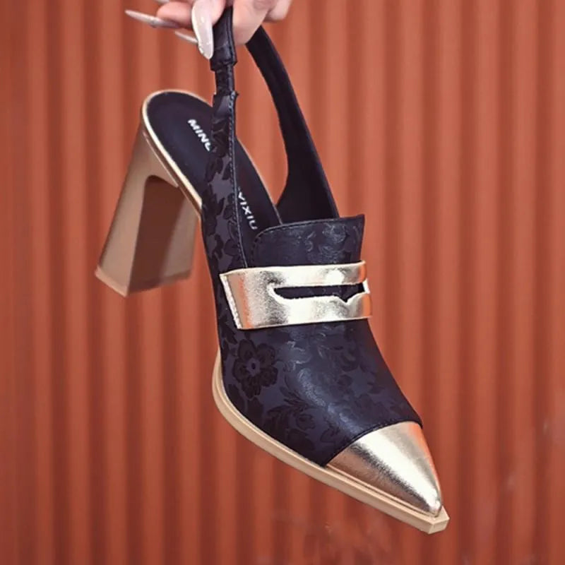 Black pointed toe high heel sandals with a chunky block heel and an elastic ankle strap.