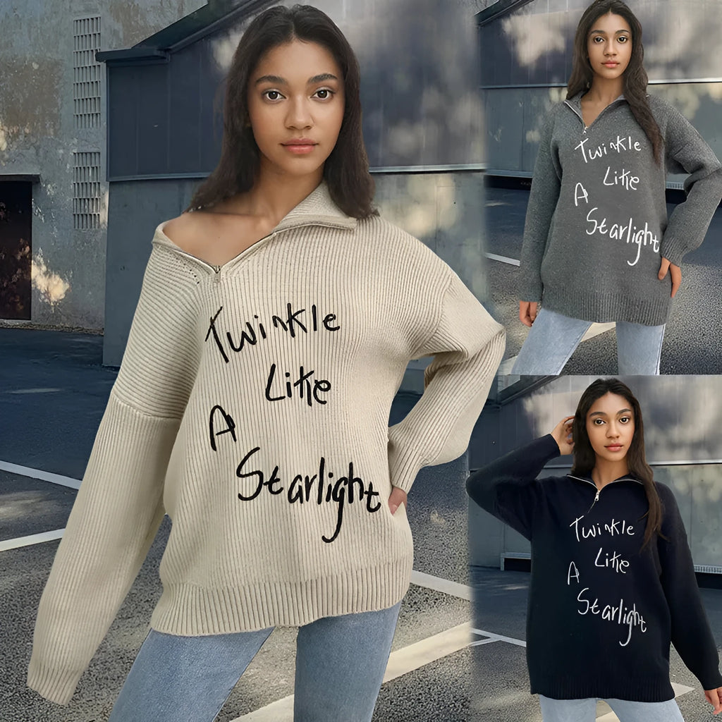 Woman wearing a light khaki retro pullover sweater with loose lapels, an oblique zip, and a text print.