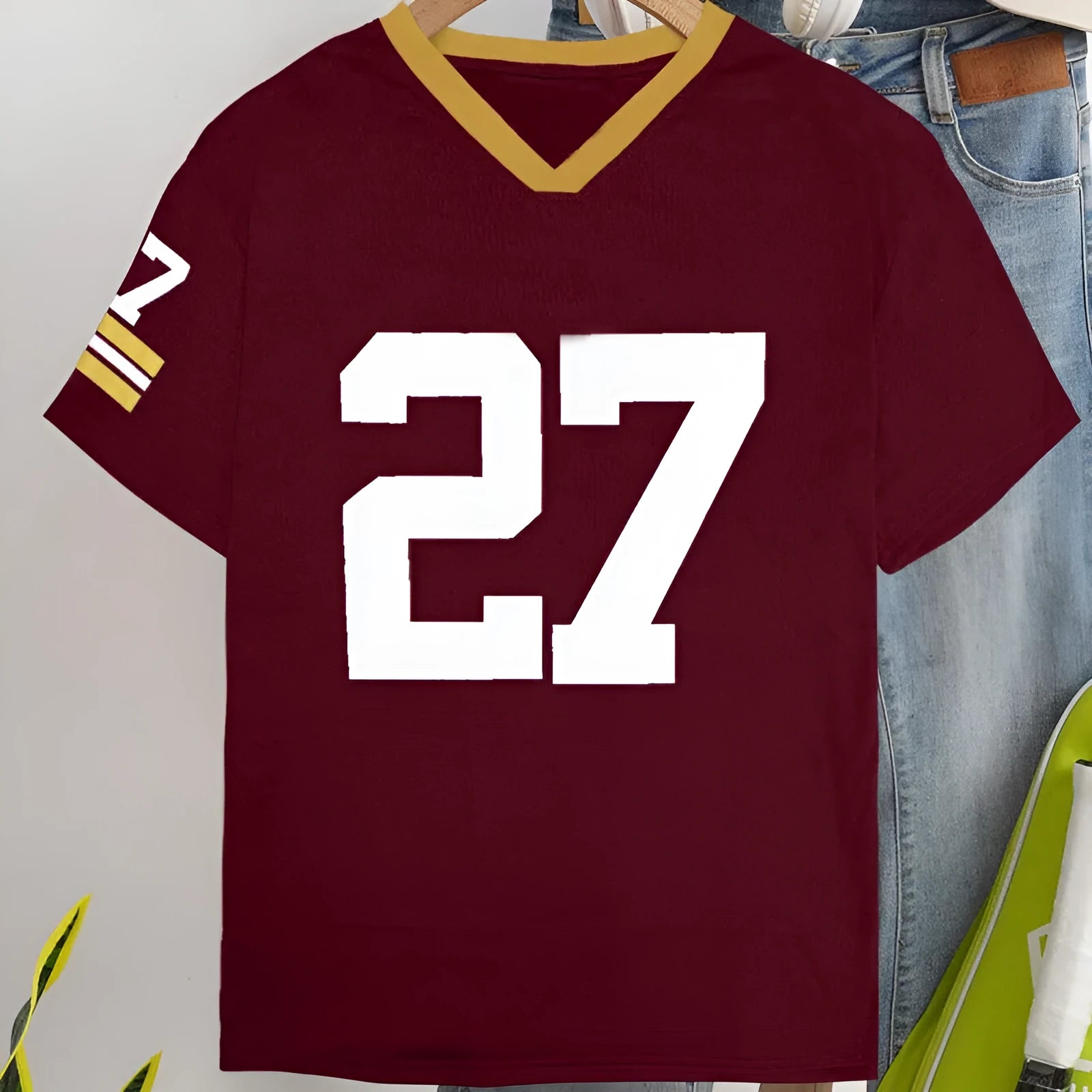 Casual loose-fitting red cotton T-shirt with a digital printed letter design on the front.