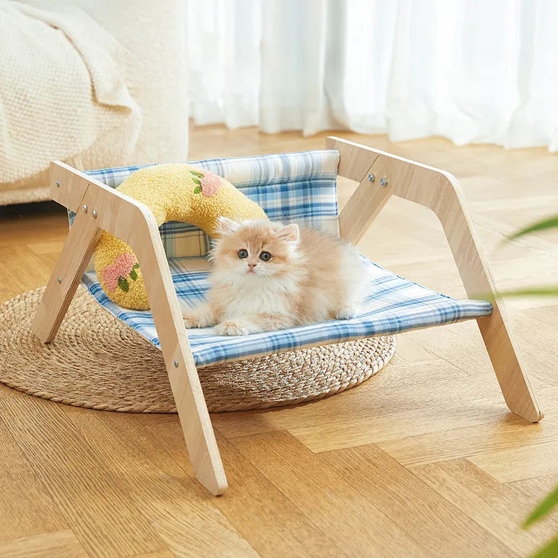 Wooden elevated cat bed hammock with soft cloth cushion in blue colour for indoor cats