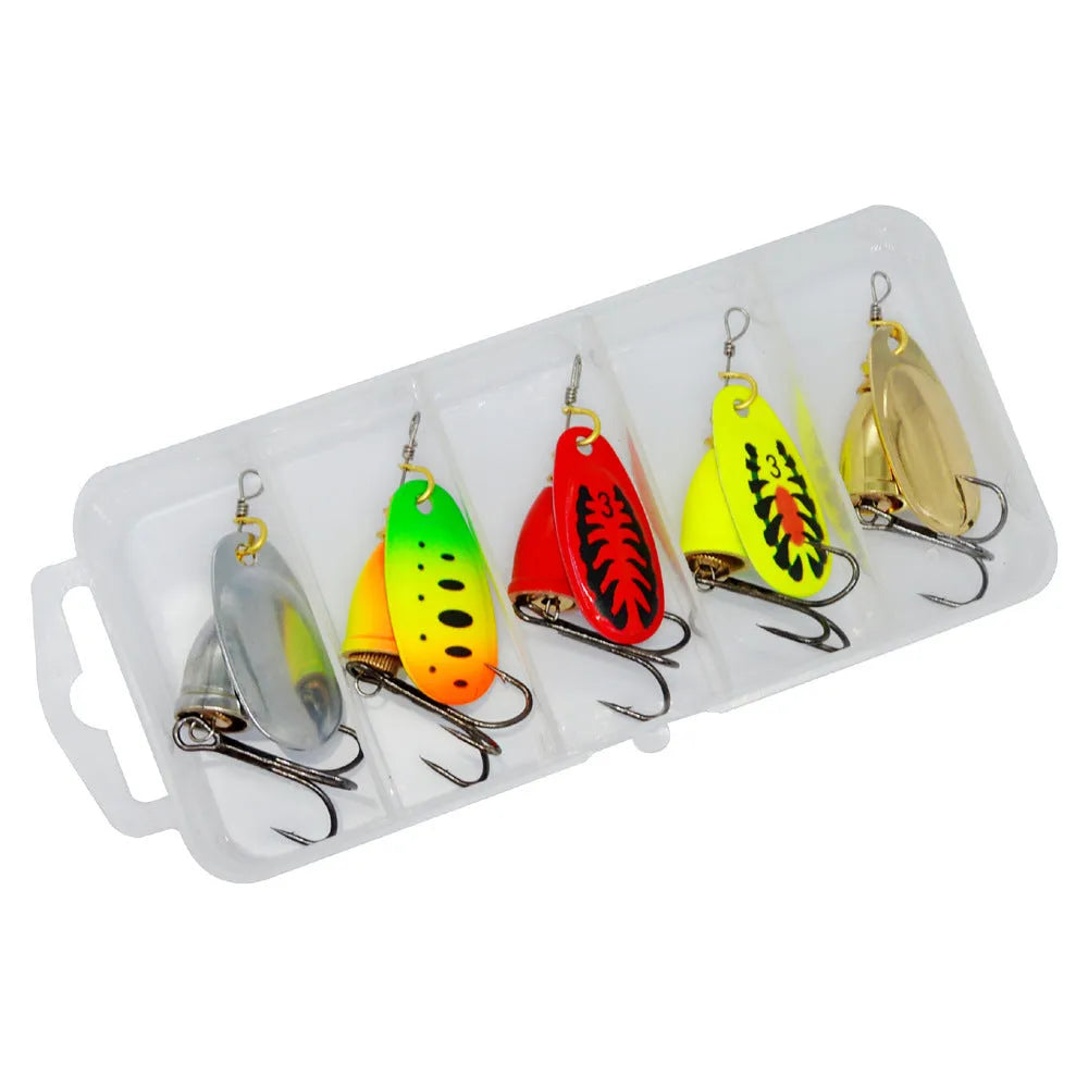 Rotating composite sequin copper bell metal fishing lure in seven colour variations on tackle background