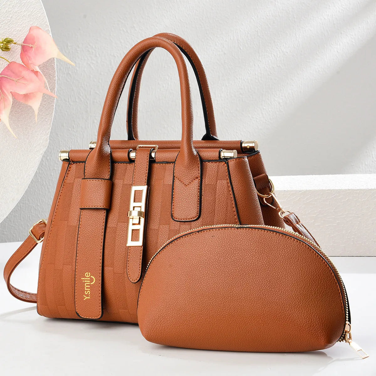 Round PU leather crossbody shoulder bag in black, shown with adjustable strap and measuring 28cm wide.