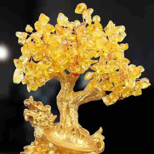 Citrine-coloured small water turtle money tree Feng Shui ornament made of resin.