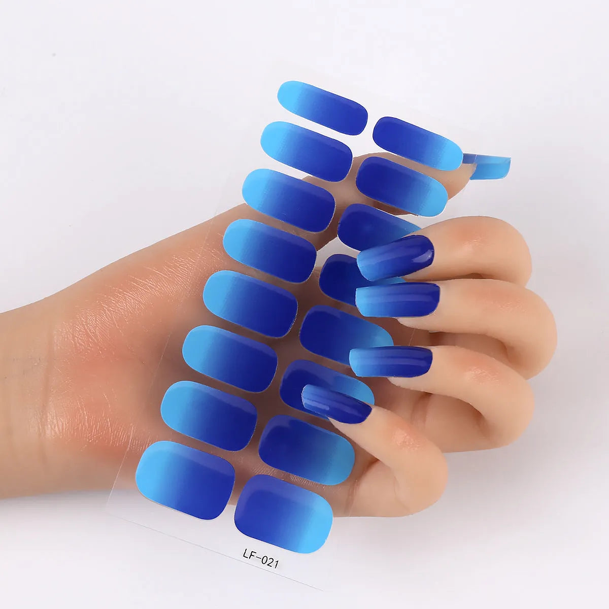 Pack of 16 solid colour full nail art stickers showing patterns like rose, leopard print, and checkerboard.