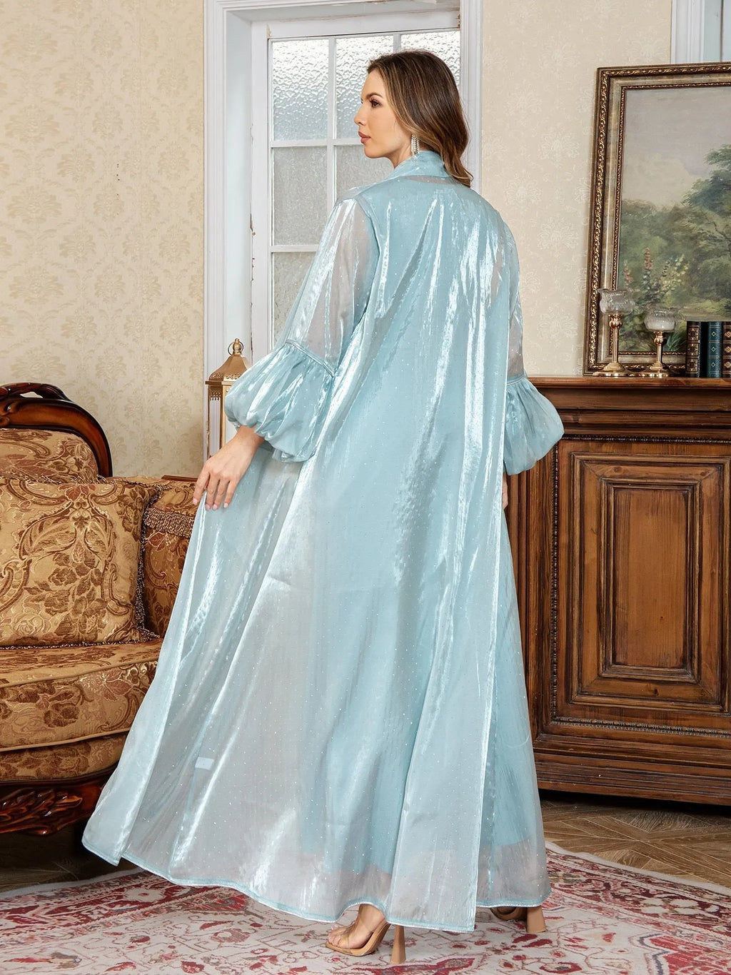 Arabic two-piece evening dress with rhinestone straps, long sleeves, and floor-length skirt in blue or brown