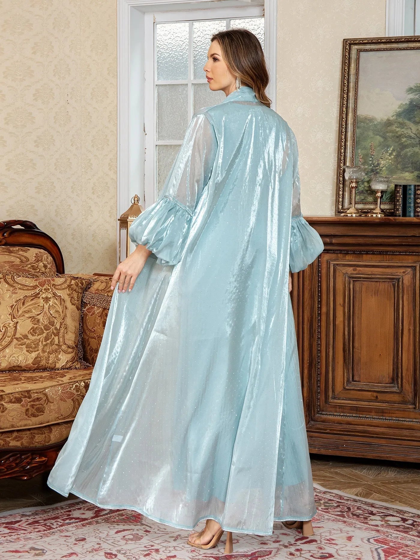 Arabic two-piece evening dress with rhinestone straps, long sleeves, and floor-length skirt in blue or brown