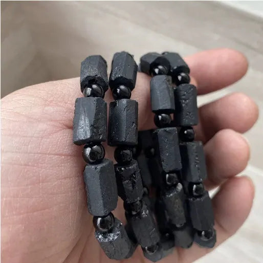Black tourmaline rough stone bracelet with 8.5-9mm beads and Seiko treatment