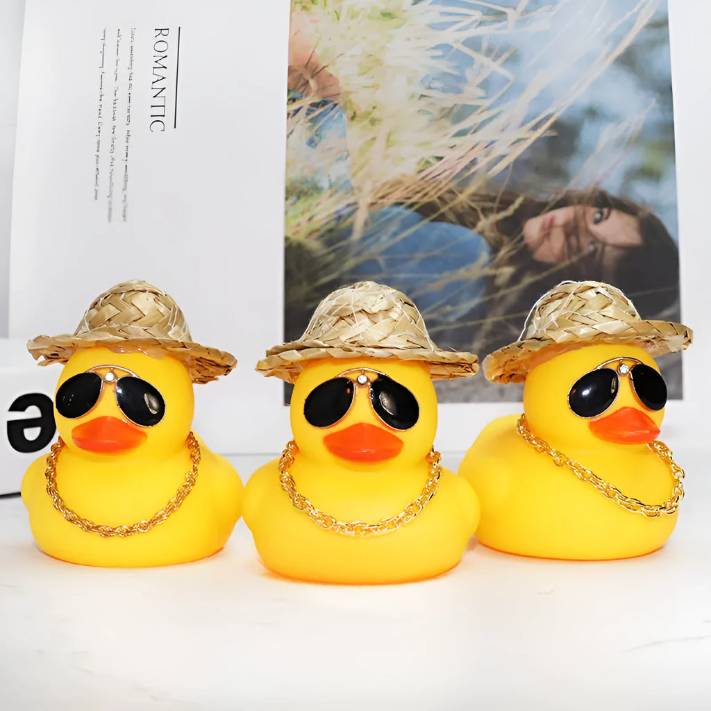 Straw hat yellow duck cartoon character car ornament with plastic alloy construction and accessory necklace