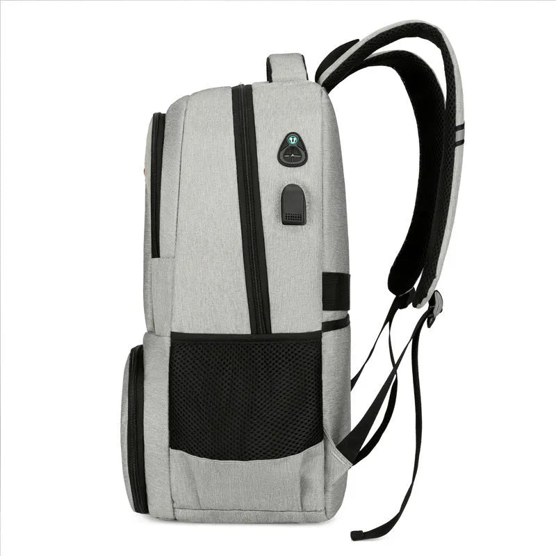Insulated Oxford cloth backpack in grey with curved shoulder straps and multiple compartments
