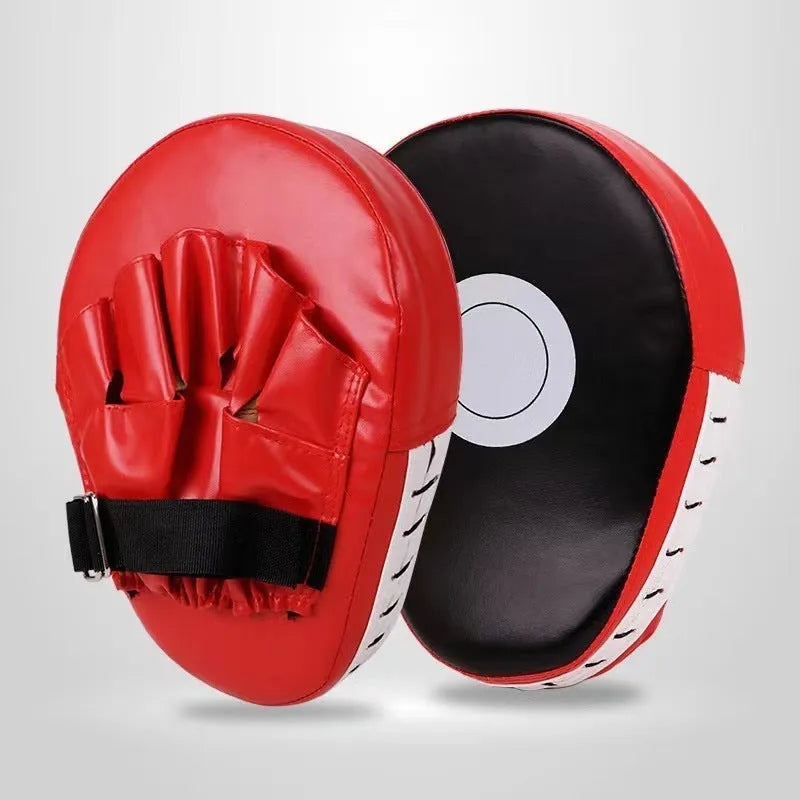 Boxing punch mitts set showing curved and flat hand target styles in red, black, blue, and yellow colour combinations.