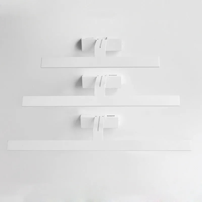 A white rectangular LED bathroom wall mirror with integrated dimmable tri-colour lighting, shown at 580mm long.