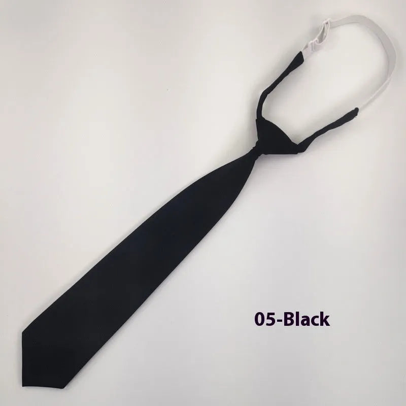 Navy blue cotton bow tie with arrow style shape measuring 35cm by 7cm