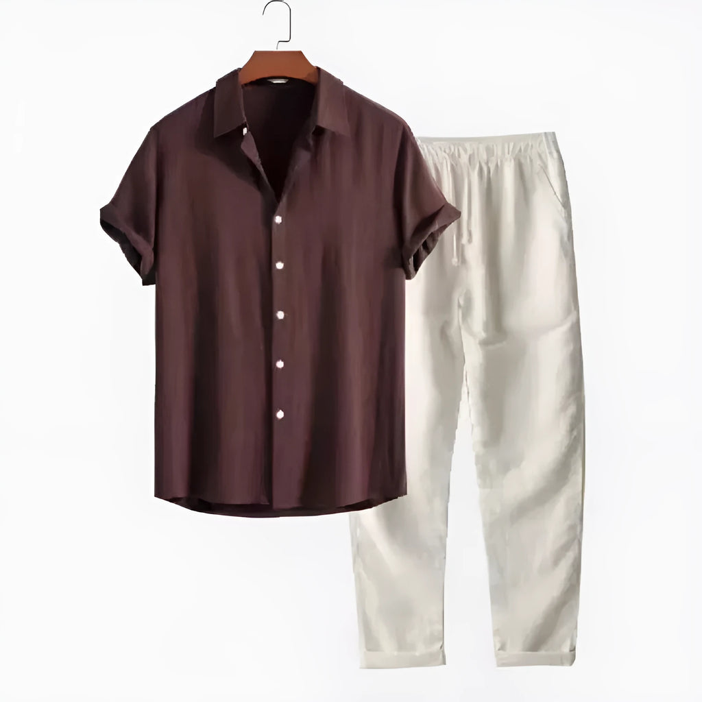 Man wearing a beige loose-fit linen-look short sleeve shirt and matching trousers from a casual suit.