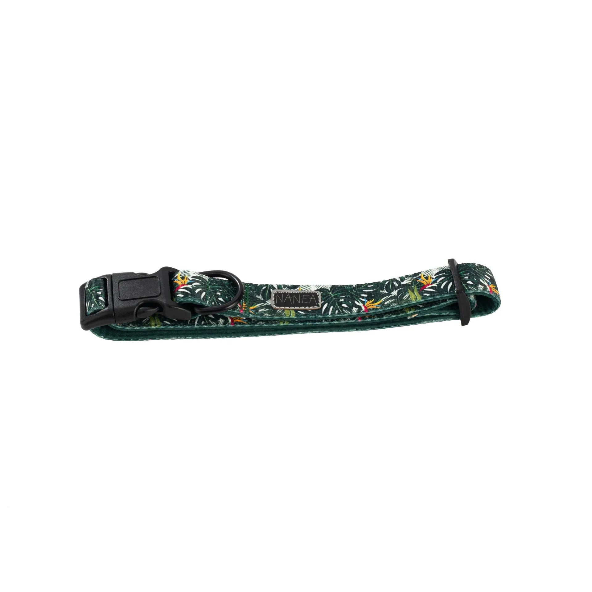 Six-piece adjustable cloth dog harness set on a table, showing vest, collar, rope, waste bag, bow, and triangular scarf.
