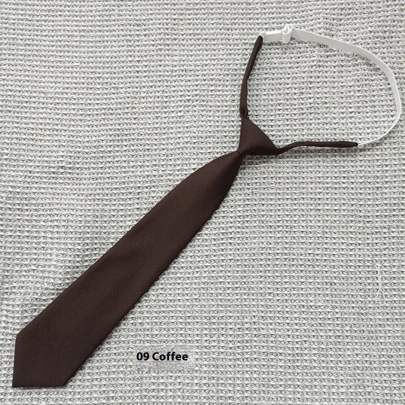 Navy blue cotton bow tie with arrow style shape measuring 35cm by 7cm