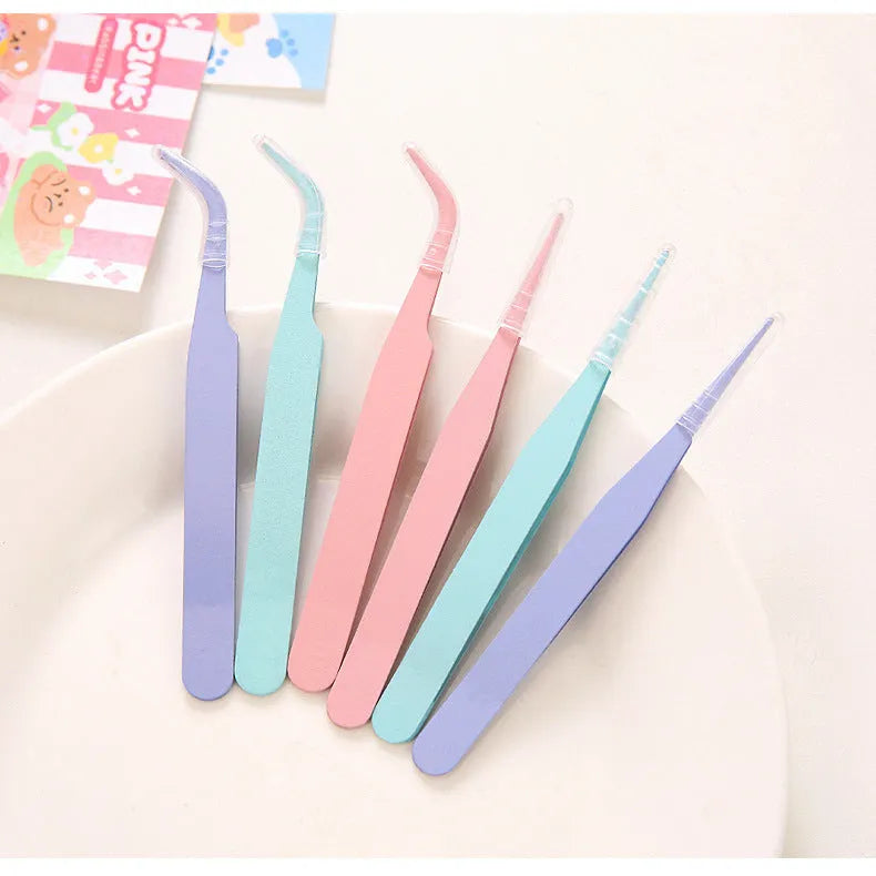 Handmade pointed or elbow eyelash tweezers in pink, blue, or purple, supplied as one piece for makeup and craft use