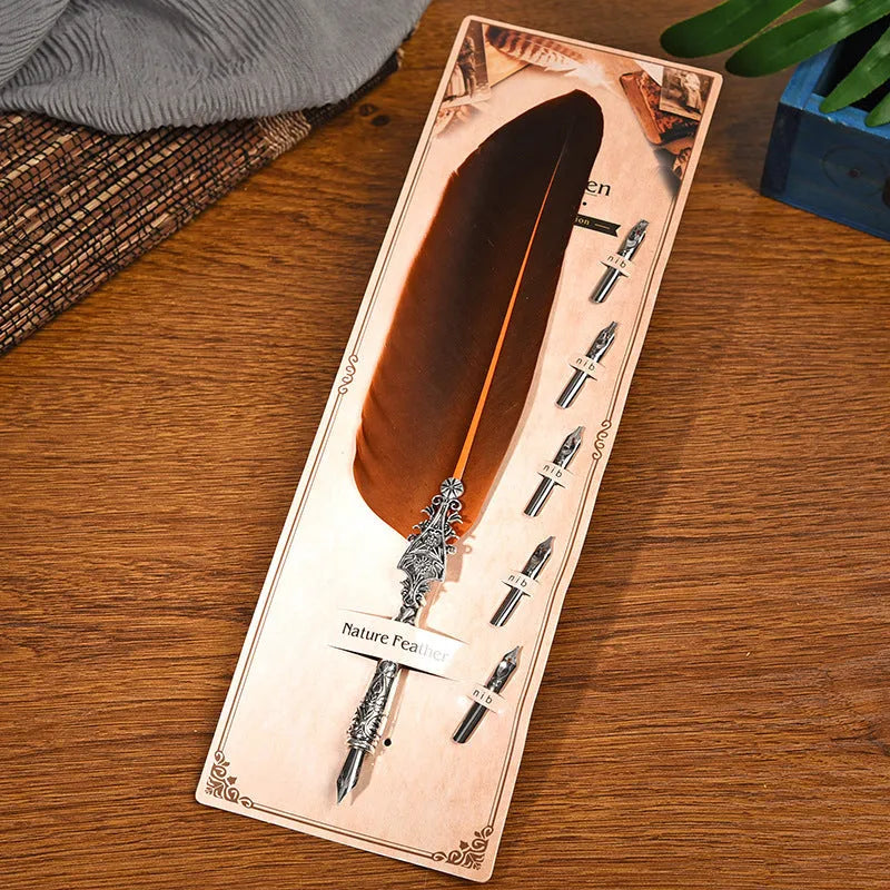 Vintage feather dip pen in 10 colours with zinc alloy construction and 30cm length