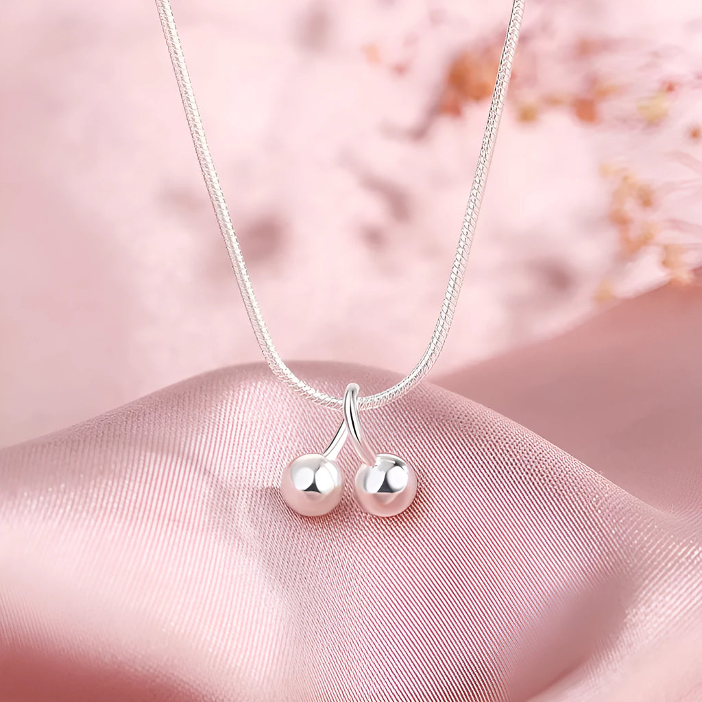 Silver cherry necklace with adjustable snake chain and fruit-shaped pendant