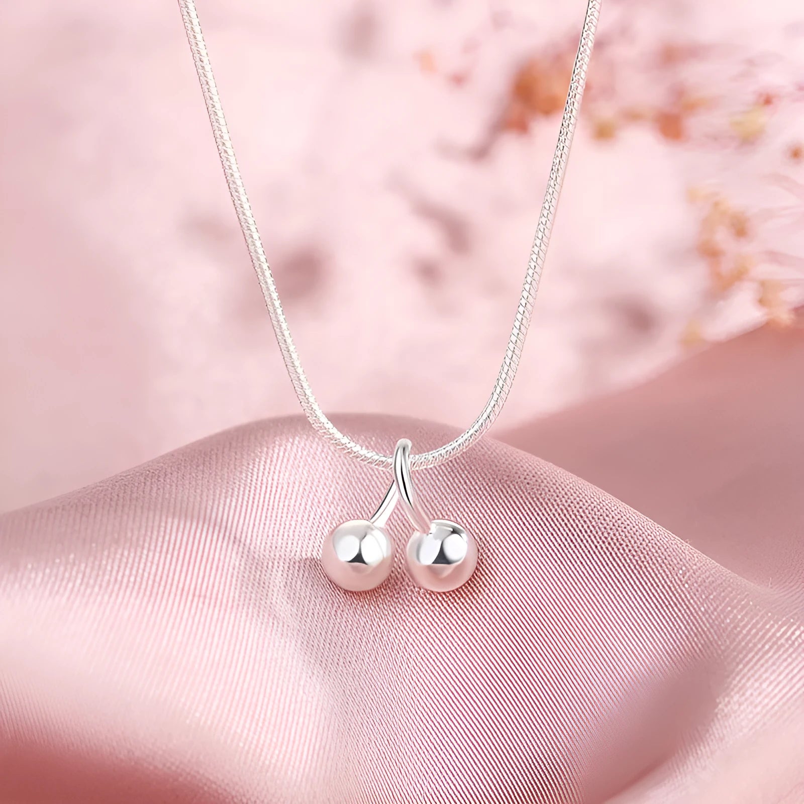 Silver cherry necklace with adjustable snake chain and fruit-shaped pendant