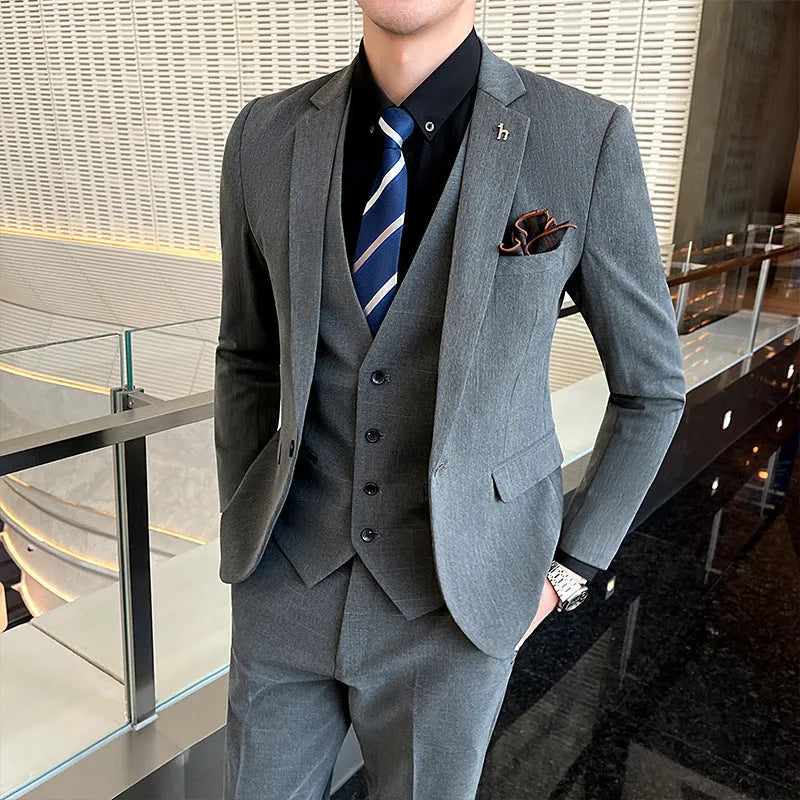 Men's slim fit British style business suit in black or dark grey cotton blend fabric