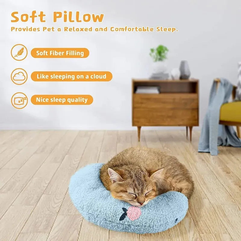 Small U-shaped plush pillow for cats and small dogs in blue colour, showing quilted faux fur texture.