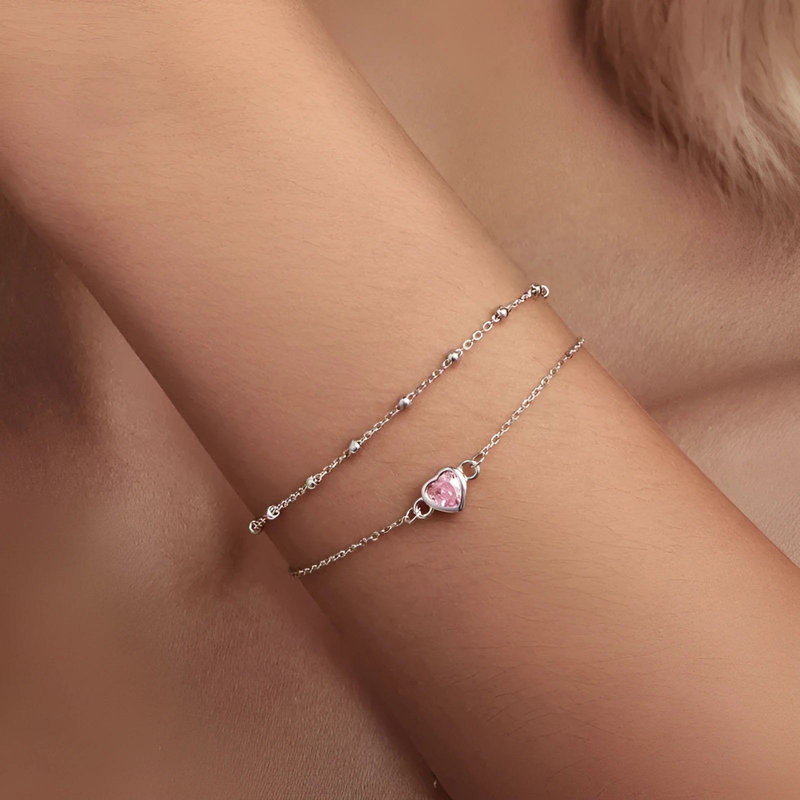 Sweet heart-shaped sterling silver bracelet with adjustable chain