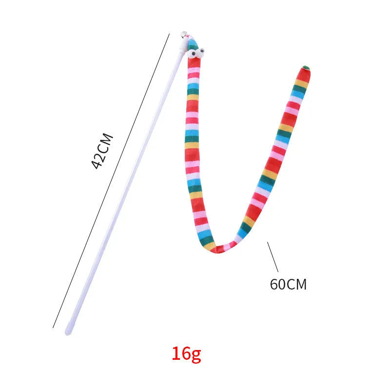 Green cat wand toy with long plush strip on a polycarbonate pole, shown mid-swing.