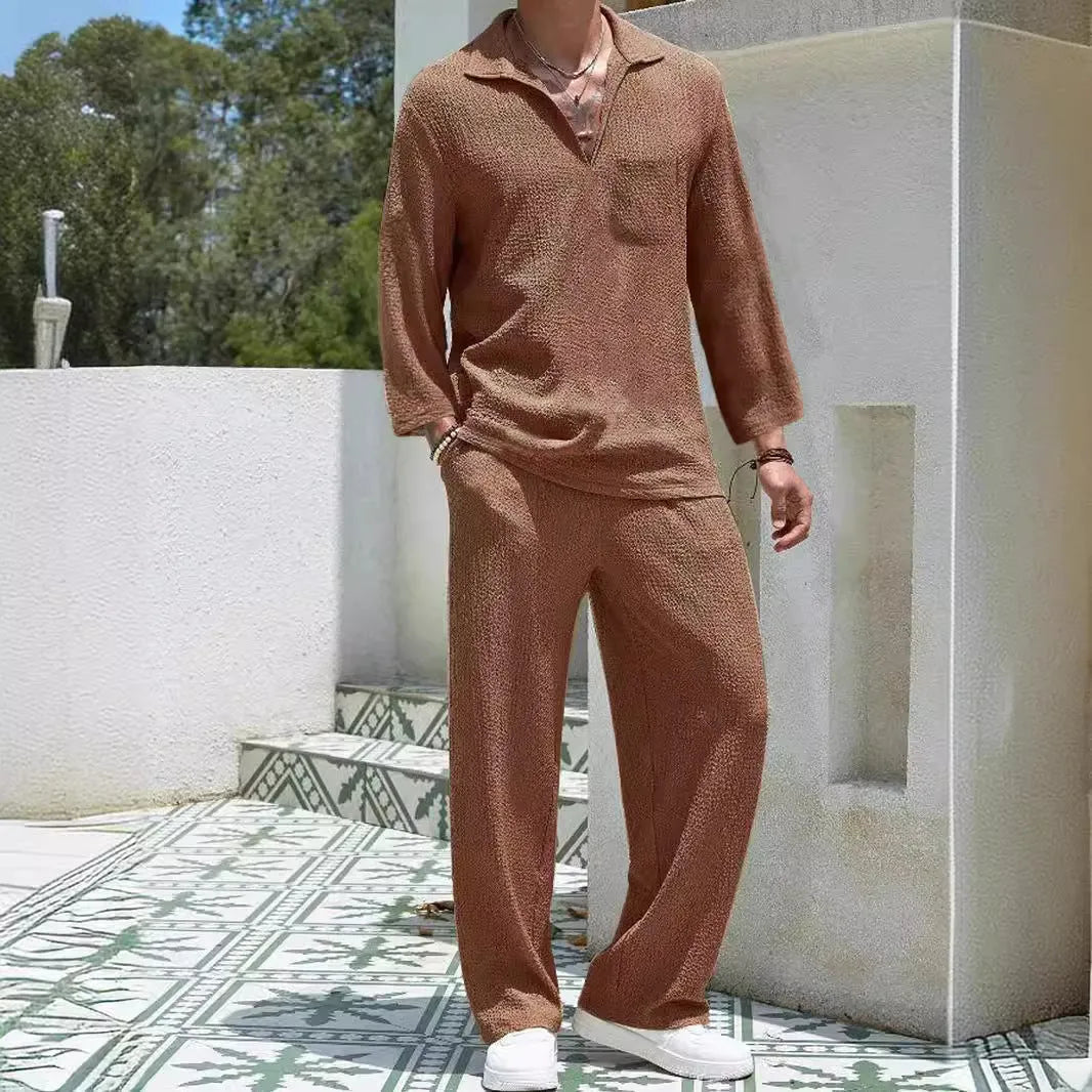 Men's casual shirt and trouser suit set in polyester fabric available in four colours.
