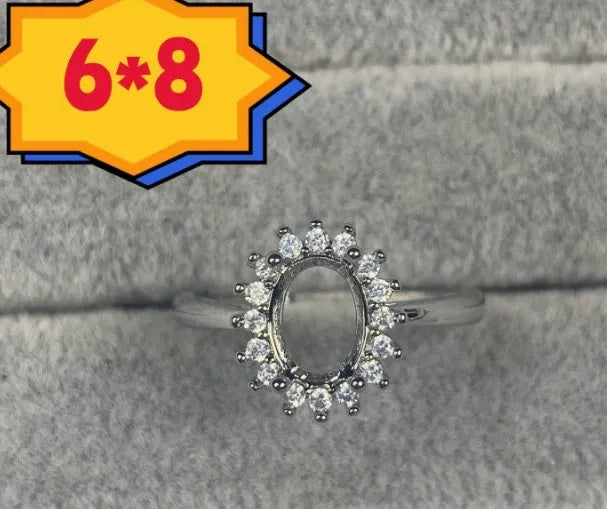 Oval denier ring with open mouth design, 6x8 main stone, and five-pointed star motif in electroplated copper