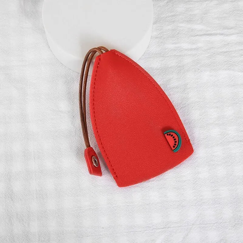 Colourful cartoon pull-out key case made from PU leather, showing the key extended from its protective sleeve.