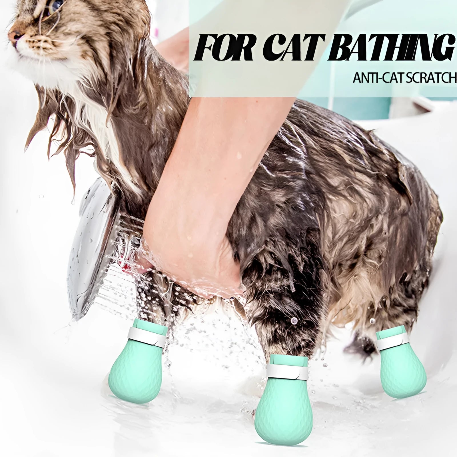 Set of four green silicone cat anti-scratch foot covers or gloves for pet handling.