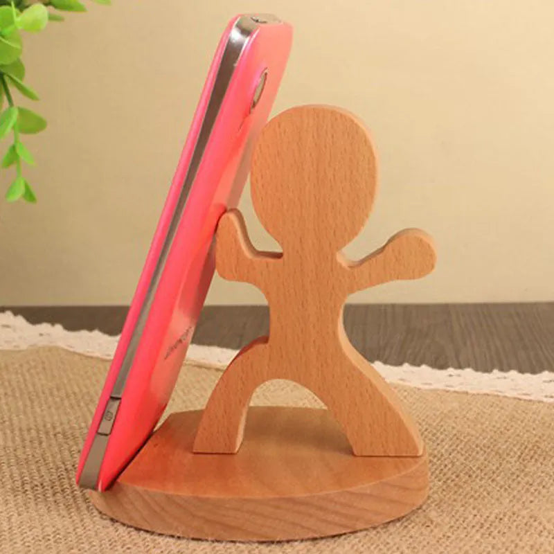 Beech wood mobile phone holder with resin animal decoration and custom lettering on coin back.