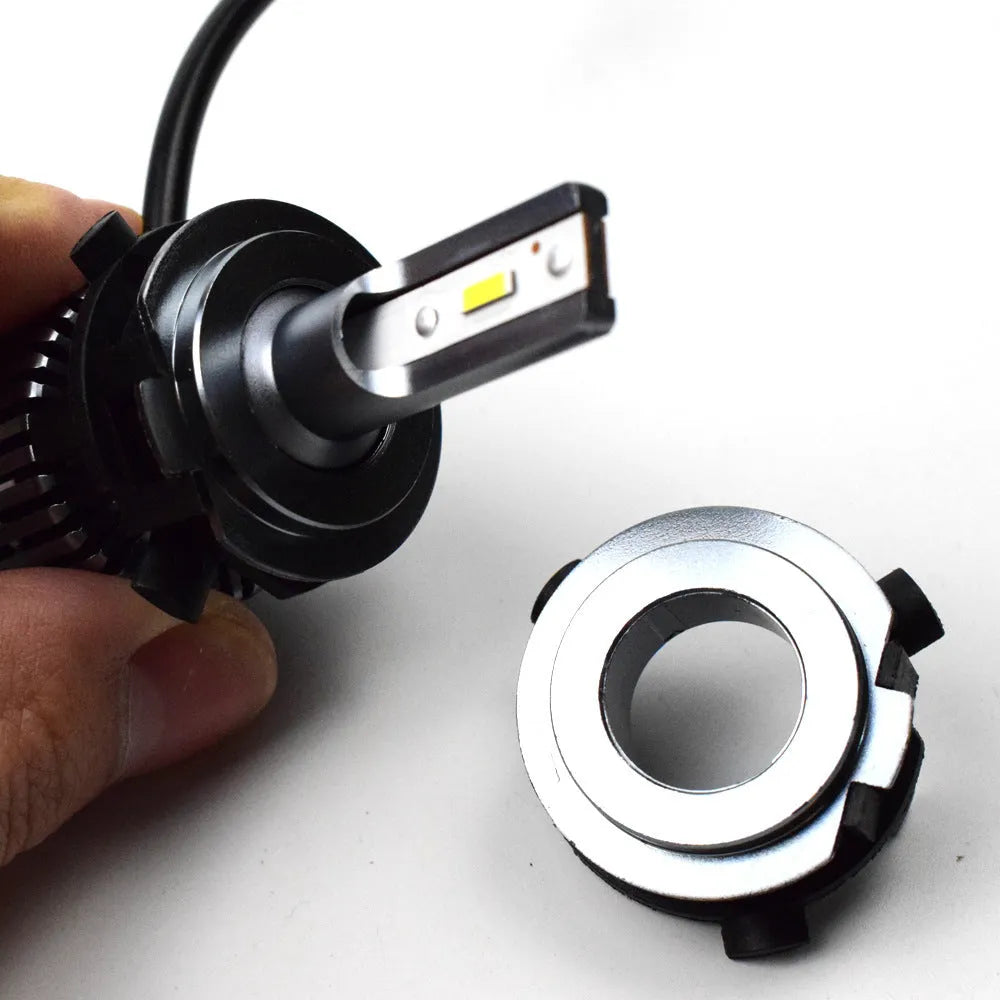 White ABS plastic car LED headlight card holder with dimensions 3.8cm by 3.7cm.