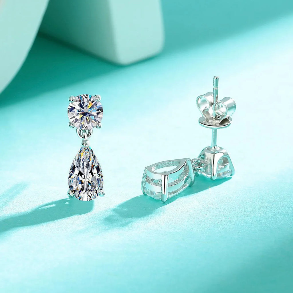 Sterling silver water drop moissanite stud earrings with geometric gold or silver plated design